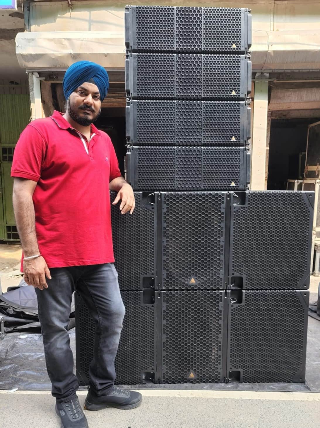 Delhi based Sunny Singh of Royal Entertainer with his newly acquired Adamson S10 cabinets and E219 subwoofers. 